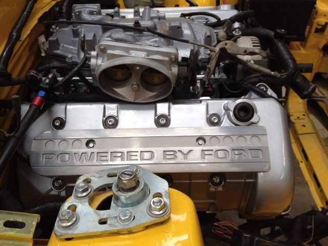 Yellow car coil cover